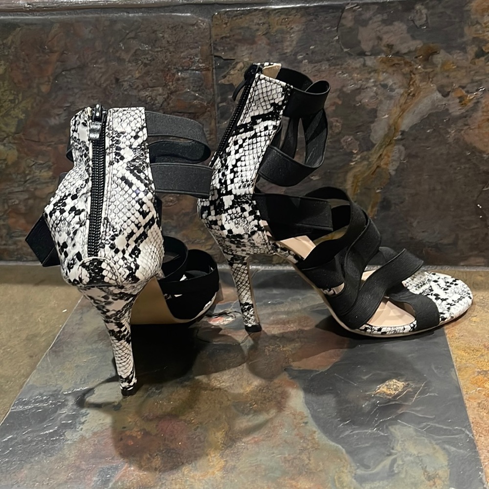 Black and white snake skin heels